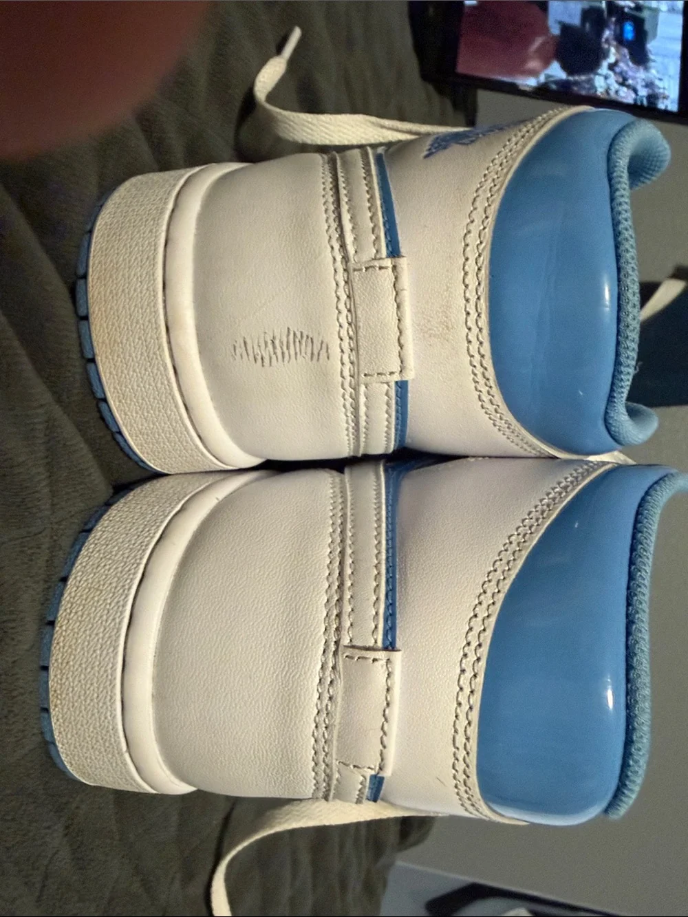 8 men’s Air Jordan UNC color way mid tops